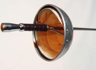 Italian Dueling Sword, close-up of hilt, showing pad and cross bar configuration. Italian Dueling Sword, close-up of hilt, showing pad and cross bar configuration.