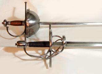 Spanish Rapiers replicas, close-up of Swept-hilt and Cup-hilt. Spanish Rapiers replicas, close-up of Swept-hilt and Cup-hilt.